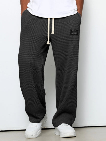 Baltasar | Pantalón Holgado de Tejido Gofrado con Cordón - StilfulltMen's pantsNegroSBaltasar | Pantalón Holgado de Tejido Gofrado con Cordón