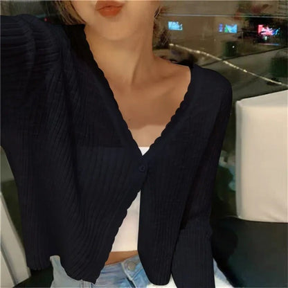 Delaney | Chaqueta de Punto Corta con Botones - StilfulltWomen's vestsDWOD4-YL616001NegroTalla únicaDelaney | Chaqueta de Punto Corta con Botones