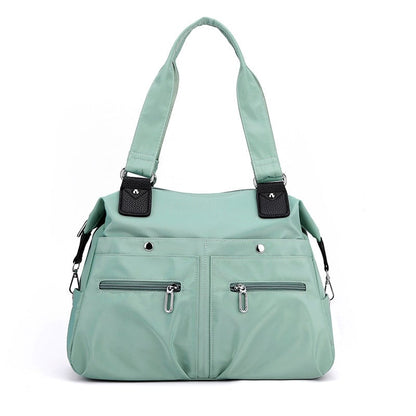 Harriet nylon shoulder bag with laptop pocket in light green