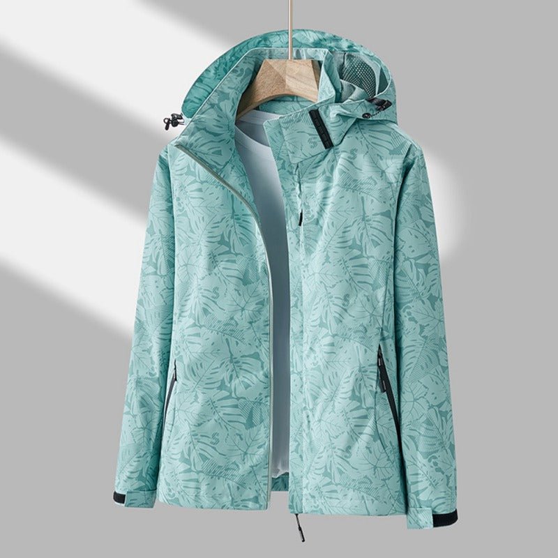 Leonor | Chaqueta Cortavientos con Capucha y Estampado de Hojas - StilfulltWomen's jacketsQVAOCNRZTurquesaXSLeonor | Chaqueta Cortavientos con Capucha y Estampado de Hojas