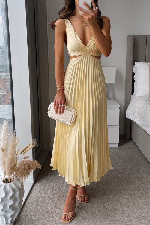 Lisana | Maxi plisserad klänning — flytande och feminin elegans - StilfulltdressGulSLisana | Maxi plisserad klänning — flytande och feminin elegans
