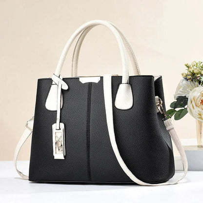 Lucienne | Bolso de Mano Estructurado con Bandolera - StilfulltWomen's handbagsVER25BLAVER9812Negro y blancoLucienne | Bolso de Mano Estructurado con Bandolera